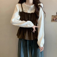 大きいサイズのフランス式のつなぎ合わせは色の偽の2つのシャツの女性の春と秋のファッションの小さいシャツのしわが見えます。