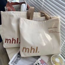 Túi canvas đeo cai 夏季新款帆布包女小众字母印花单肩包