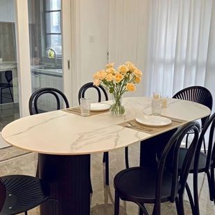 Modern Simple Black Oval Dining Table Household Small Apartment Dining Room Light Luxury Cyber Celebrity Cream Style Rock Plate Dining Table