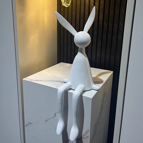 Minimalist modern black and white long ear rabbit figurine, cute rabbit sitting posture sculpture, living room TV cabinet home decoration item