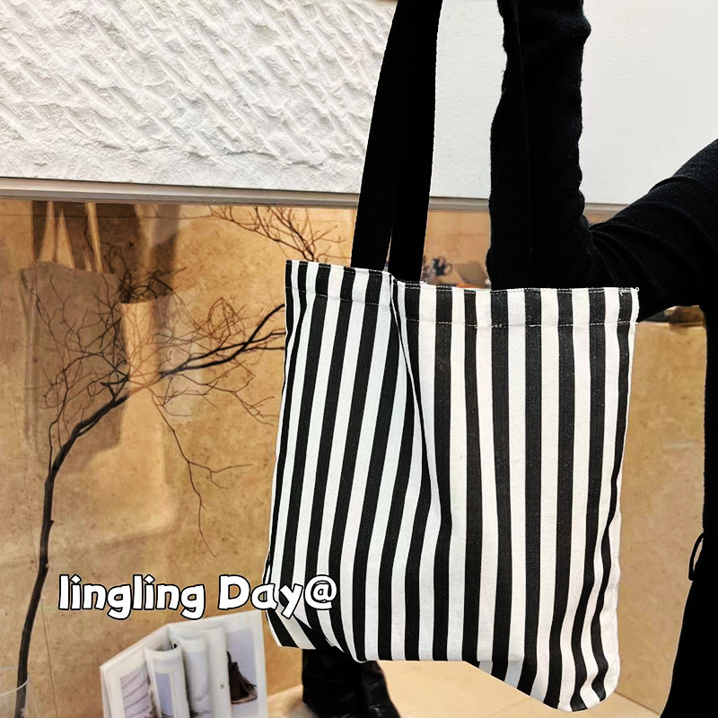 Ventas Directas de fábrica Nueva bolsa de lona bolso de hombro de gran capacidad bolso de mano Estudiante Libro de clase bolsa de mensajero