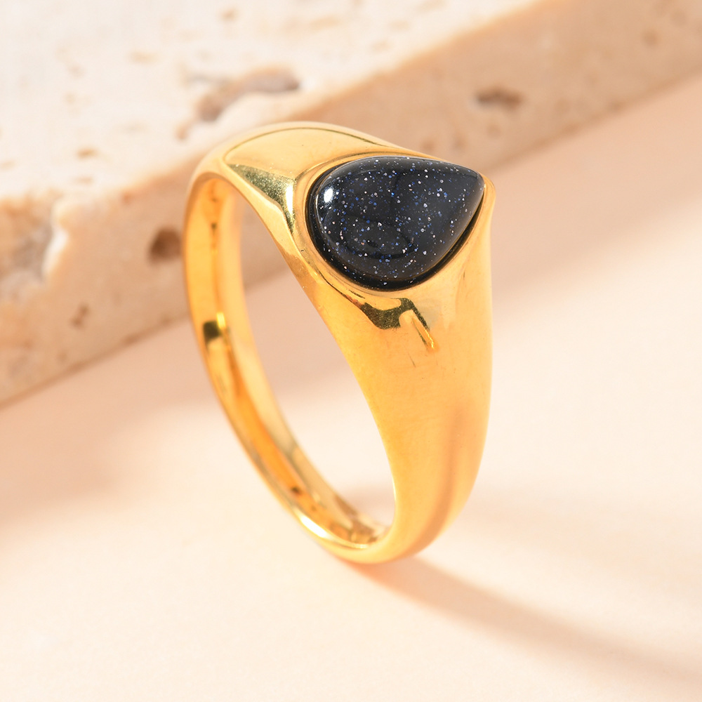 Anillo de acero de titanio de moda europea y americana mujer no se desvanece fundición de gota de agua anillo de piedra natural joyas de lujo al por mayor