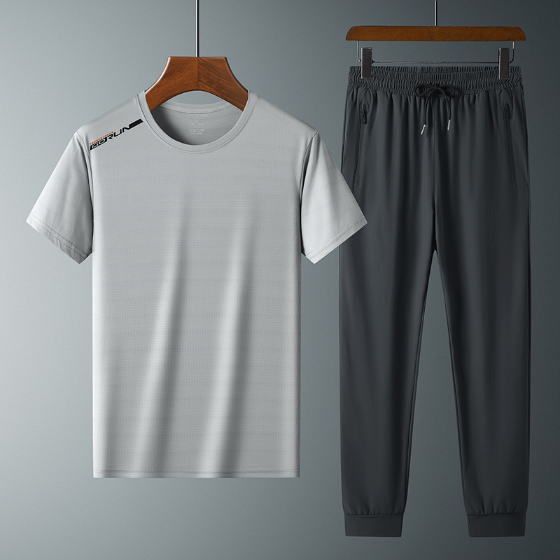 Moda pantalones de seda de hielo cuello redondo Camiseta de dos piezas para hombres talla grande suelta de secado rápido traje deportivo LOGO se puede formular
