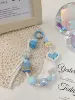 Three-dimensional bead blue bow, a mobile phone clip, another shot
