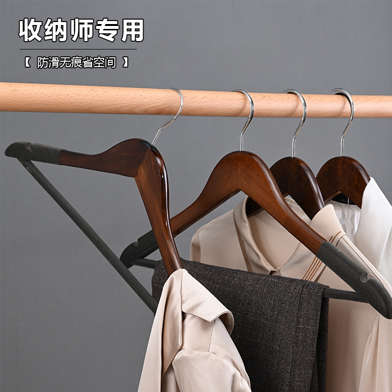 De gama alta de almacenamiento de ropa antideslizante de madera sin costura percha tienda de ropa de hotel soporte de madera maciza flocado percha de madera percha de ropa