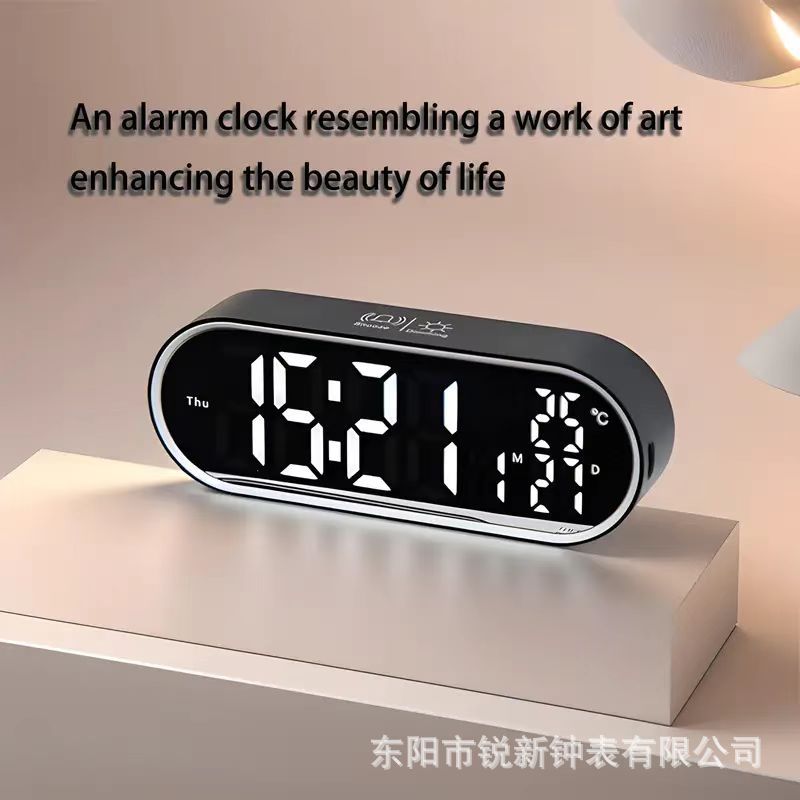 Reloj despertador electrónico ovalado de plástico, venta directa de fábrica, multifuncional, se puede usar como espejo, estilo coreano simple.