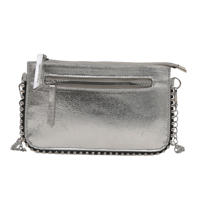 Casual coreano simple bolso de mano retrógrado personalidad bolso de mano para mujeres 2025 primavera nueva moda brillante bolso de hombro