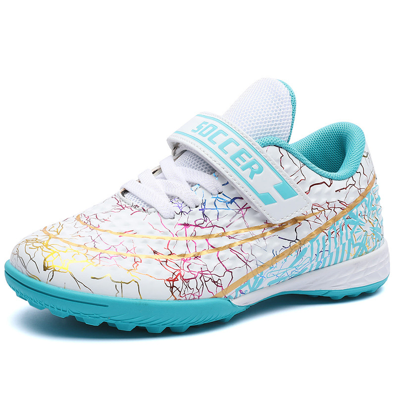 Nuevos zapatos de fútbol transfronterizos para niños tf clavos jóvenes zapatos de entrenamiento de combate profesional zapatos deportivos artificiales para niñas