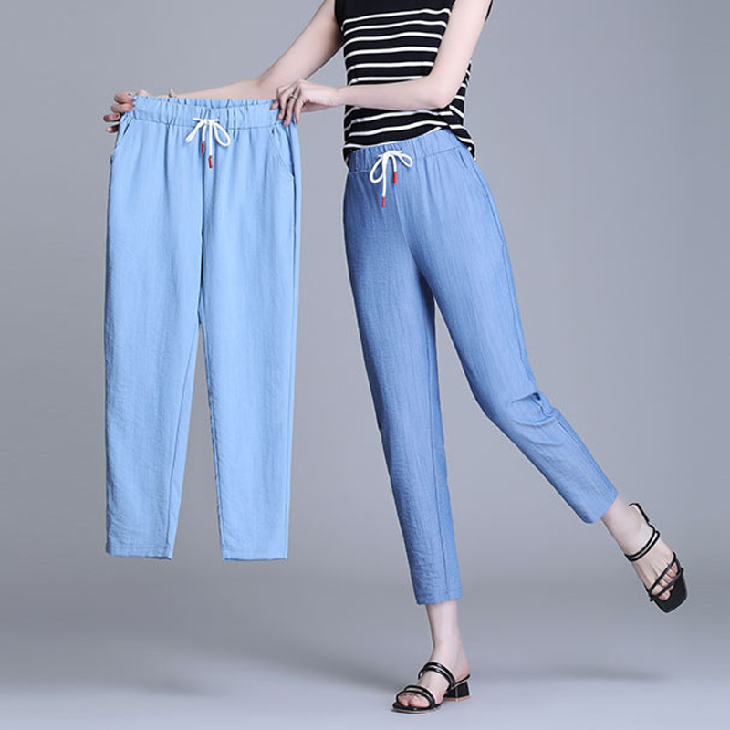 天絲牛仔褲女春夏冰絲高腰寬松休閑小腳松緊腰薄款垂感九分哈倫褲