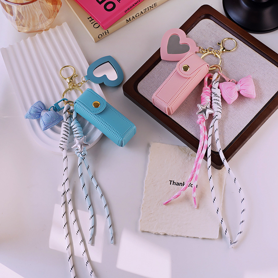 Mini bolso accesorios accesorios 2026 nuevo bolso de lápiz labial con espejo llavero de cuero colgante de cadena de teléfono móvil
