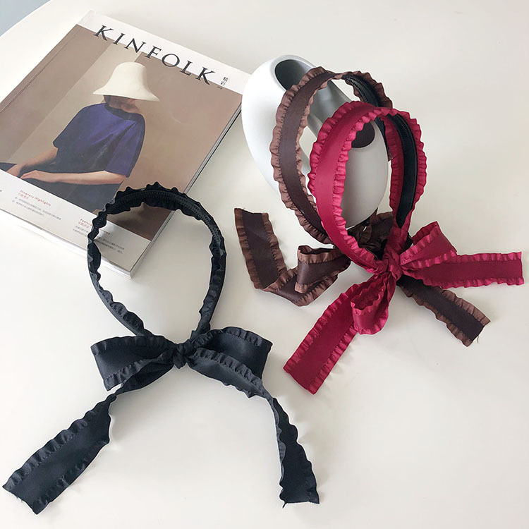 Korean New Ruffled Braided Bowknot Headband display picture 4