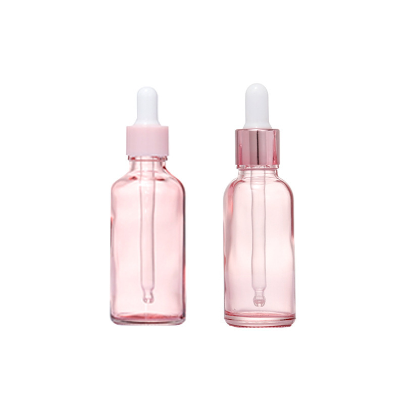 Botella de aceite esencial de color rosa transparente Esencia de líquido sub-botella gotero de vidrio Aceite de Masaje puro Rocío líquido sub-envasado de vidrio botella vacía