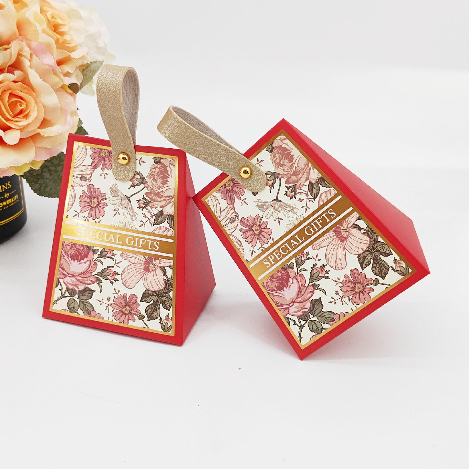 Creative floral gold foil wedding candy box with leather handle table candy packaging, gift set with congratulations eggs and candies, return gift box