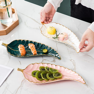 Nordic -style gold -edge plate jewelry plate ceramic jewelry storage plate sushi leaf discos.