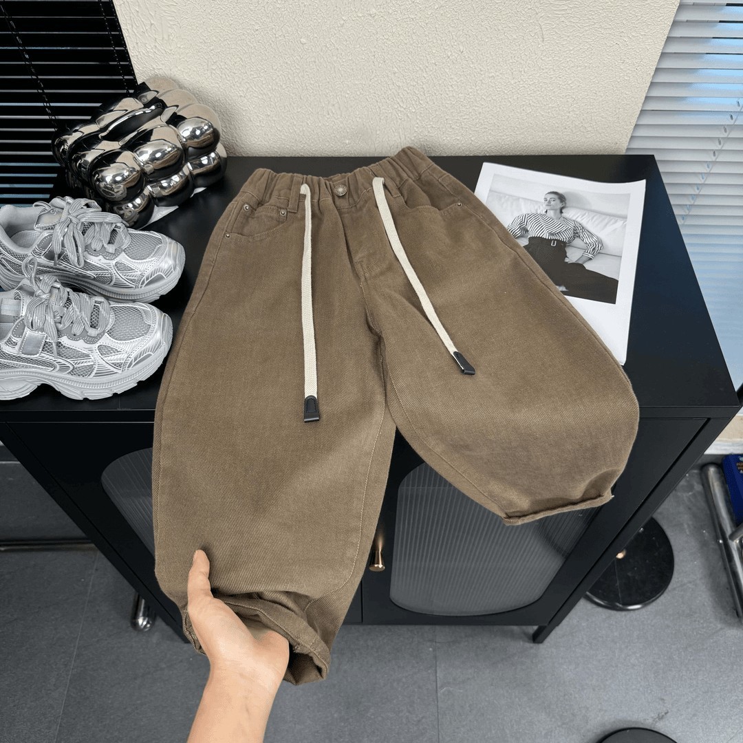 新しいファッションのファッションのファッションの子供服のズボンの男の子のズボンの春秋の金のゆったりしている服装の韓国版の男の子のカジュアルなズボン