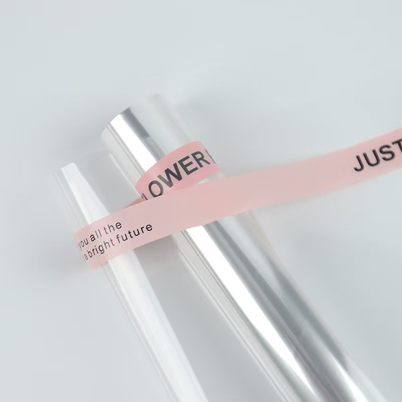 Celofán a prueba de polvo al por mayor opp forro de plástico de papel de embalaje de flores paquete de ramo celofán transparente en stock