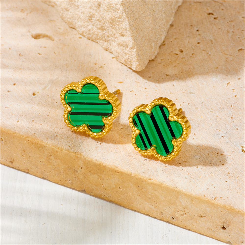 Nueva moda europea y americana no-desvanecimiento de acero de titanio de cinco hojas serie de trébol de moda de lujo ligero espárragos pulsera collar traje