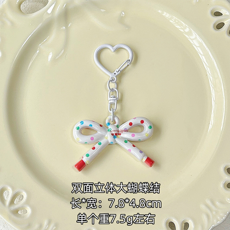 かわいい両面プリント中空弓キーホルダー diy ジュエリーペンダントバッグ携帯電話ペンダントギフトアクセサリー|undefined