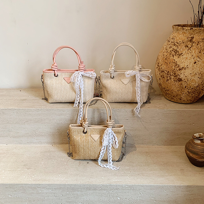 Bolsa de tela retro 2025, bolso de mano de paja de gran capacidad, nueva moda europea y americana, bolso de hombro empalmado