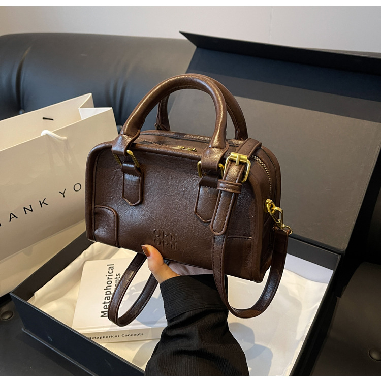 2024 New Maillard Retro Small Pillow Bag Women's Autumn and Winter Trend Korean Handheld Small Square Bag Versatile Crossbody Bag_voghion.com