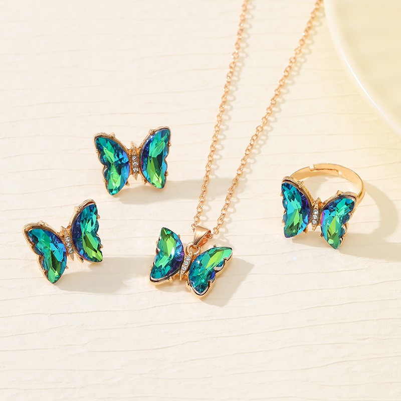 Ventas transfronterizas calientes coloridas 3 piezas de aretes collar anillo de moda europea y americana mariposa elegante collar de diamantes para mujeres