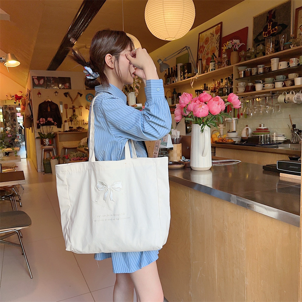 44284 large-capacity double-sided embroidered bow, sweet tote bag, single-shoulder cloth bag, canvas schoolbag for girls undefined