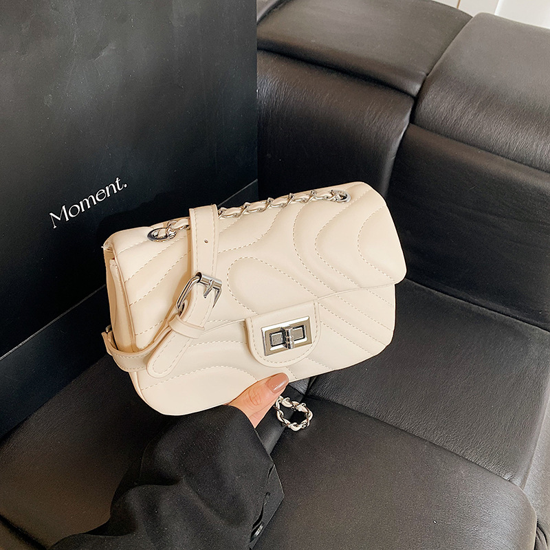 Bolsos de cadena de moda de comercio exterior para mujer 2025 nuevo bolso de hombro con textura de todo fósforo de alta calidad