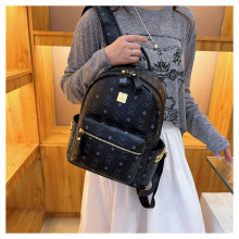 背包女双肩包2025新款小众皮质大学生书包高级感大容量女士旅游包