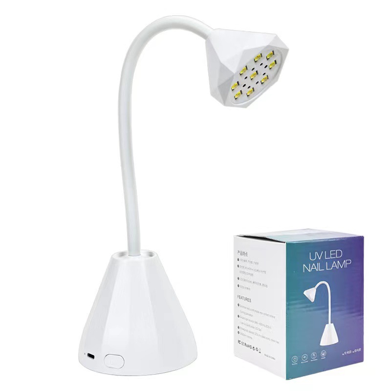 Nuevos productos de estilo japonés de manicura de cabeza de diamante lámpara de fototerapia de escritorio inducción de almacenamiento de energía no oscura máquina de fototerapia de pegamento de manivela de secado rápido
