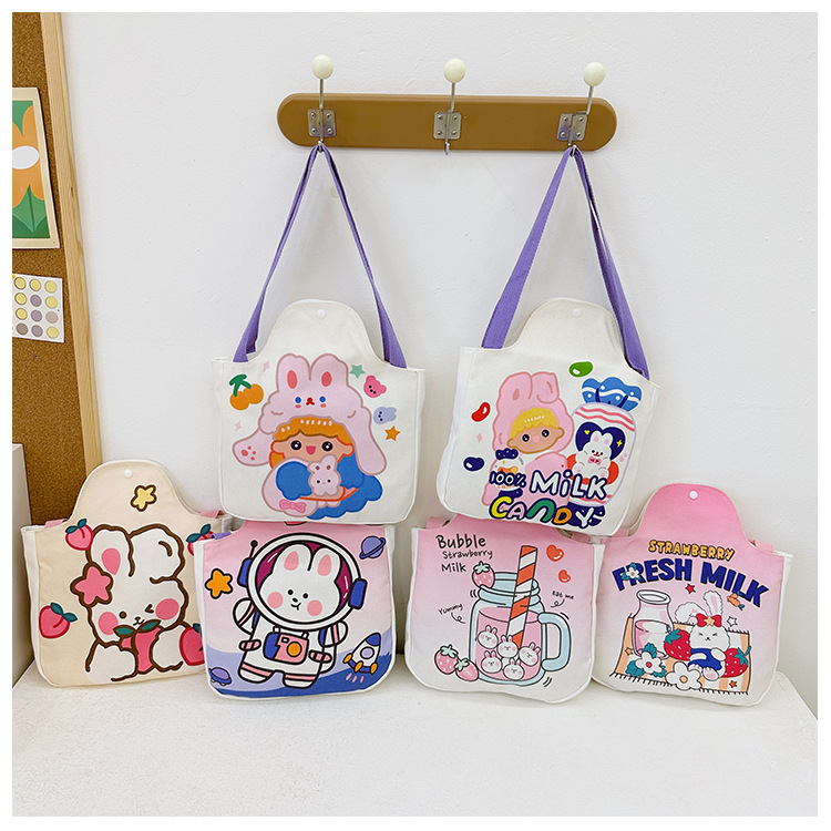 Wholesale cartoon canvas bags, female student tutorial bags, Japanese-style illustration large-capacity single-shoulder bags, cute hand-carry bags undefined