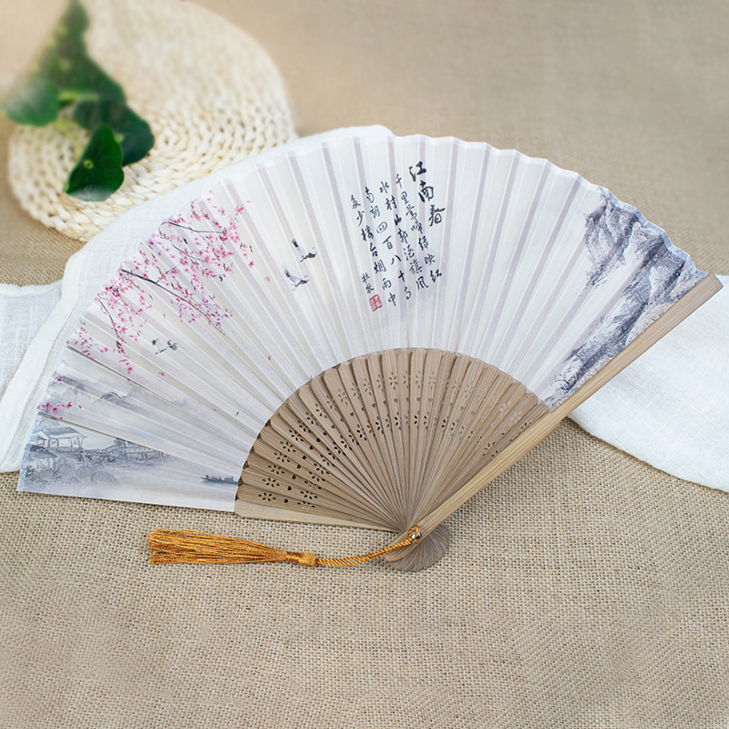 Ventilador plegable de estilo artístico pequeña tinta fresca Ventilador plegable de carácter chino hombres y mujeres ventilador de pareja sin corazón pequeño ventilador de 6 pulgadas para hombres pequeños al por mayor