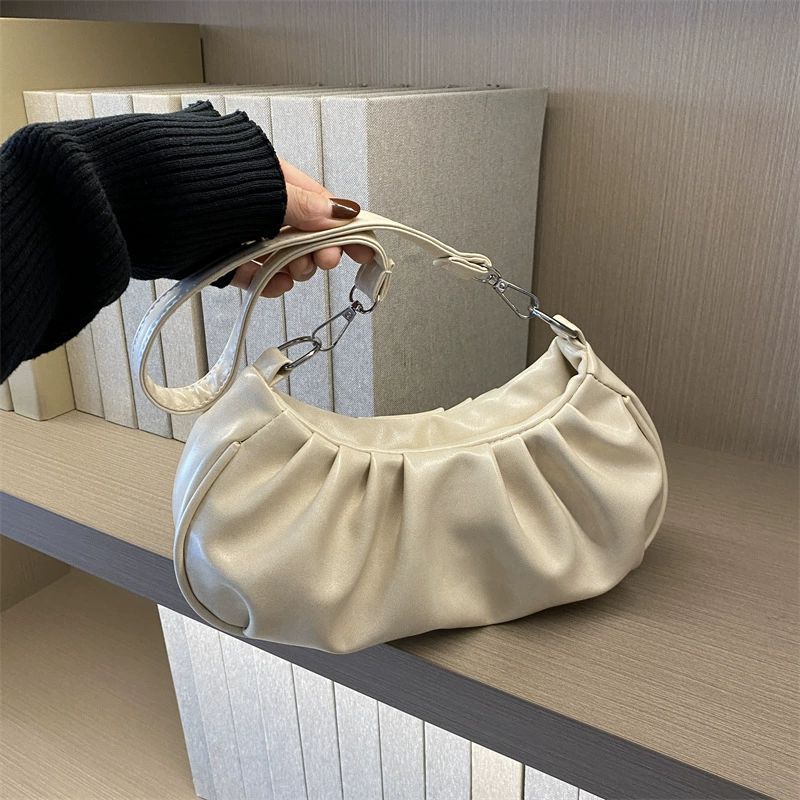 Летняя мягкая кожаная сумка-багет для женщин Niche 2025, плиссированная сумка через плечо, высококачественная корейская версия, универсальная.