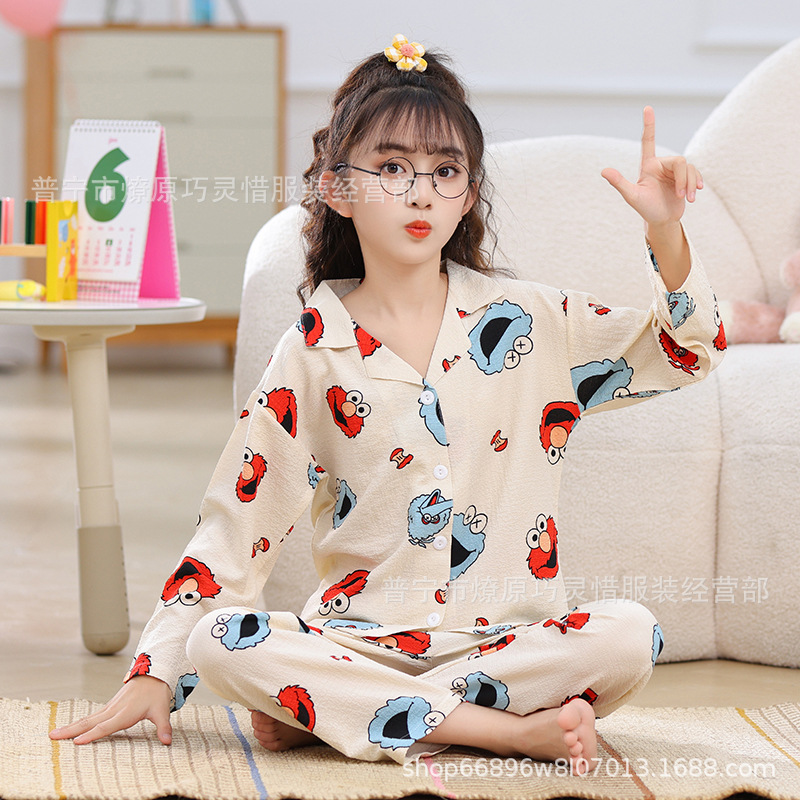 Pijama de niñas primavera y otoño dibujos animados tela espuma de tela delgada manga larga lindo ropa para niños de tamaño medio y grande ropa para el hogar