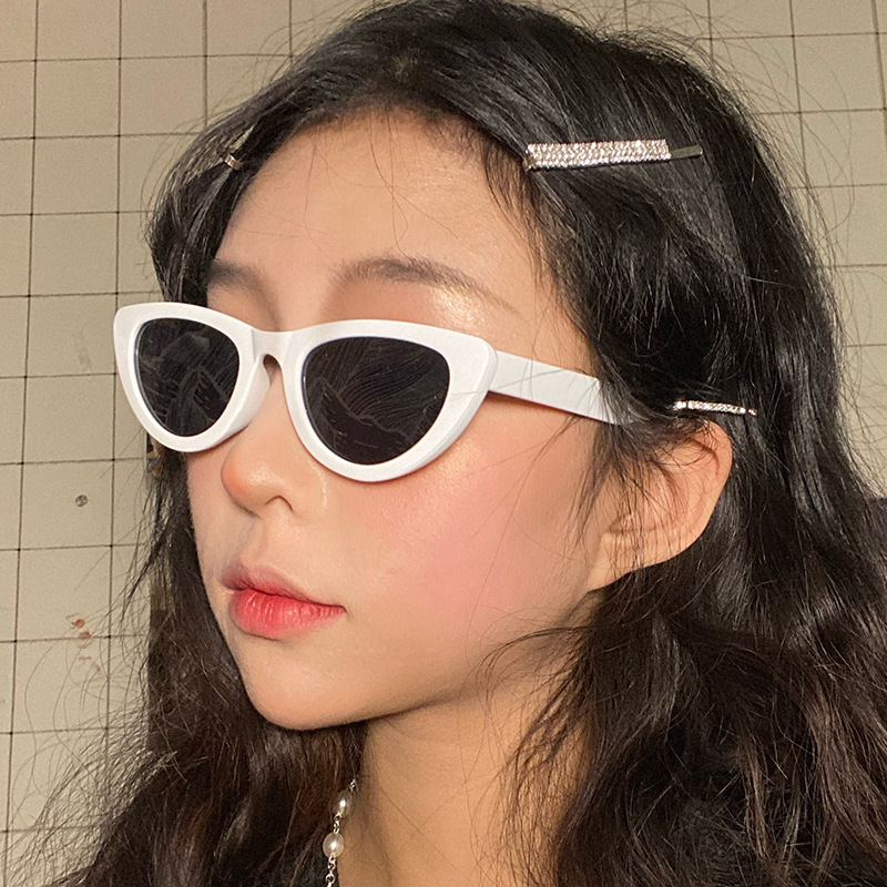 2020 nuevo triángulo europeo y americano ojo de gato gafas de sol de moda de las mujeres personalidad oval pequeño marco gafas de sol 97078