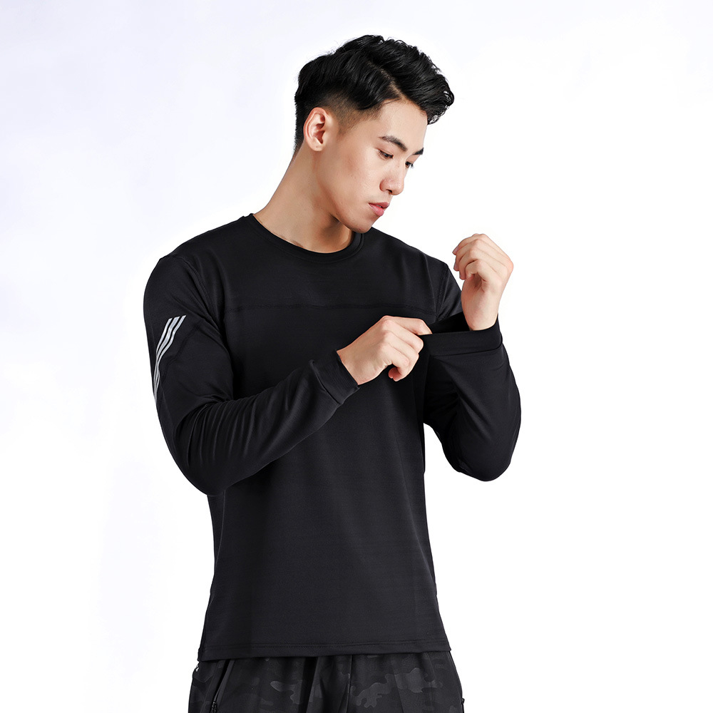 El otoño y el invierno de los hombres de deportes camiseta superior al aire libre de la aptitud de secado rápido de manga larga estiramiento suelto más tamaño en la acción al por mayor A