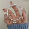 Flowery bell bracelet