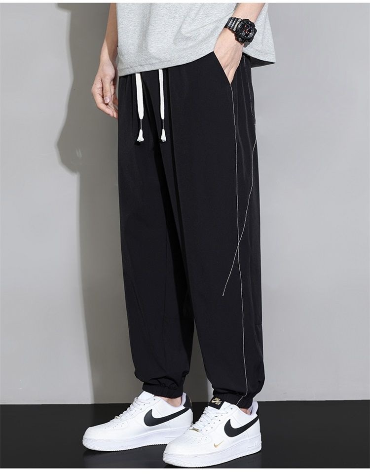 Quần jogger nam bo gấu dài ống bó, chất liệu băng lụa mỏng mùa hè, form rộng thùng thình, phong cách thể thao, nhiều size từ M đến 8XL — màu đen, màu xám đậm, màu kaki chi tiết 12