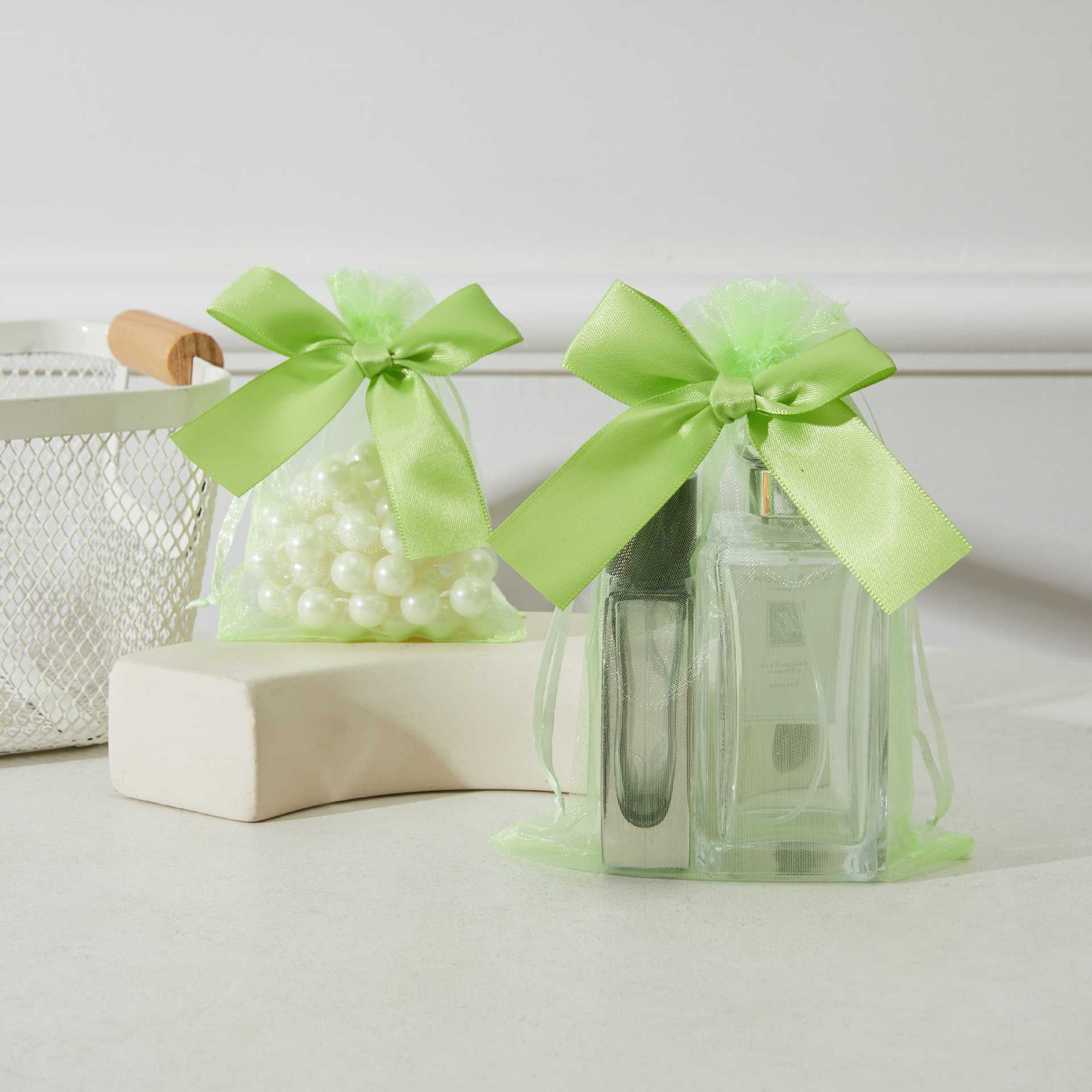 Bolso de gasa con lazo dorado transfronterizo, bolsa de dulces de boda, bolsa de regalo para fiesta, bolsa de embalaje de regalo, bolsillo con cordón