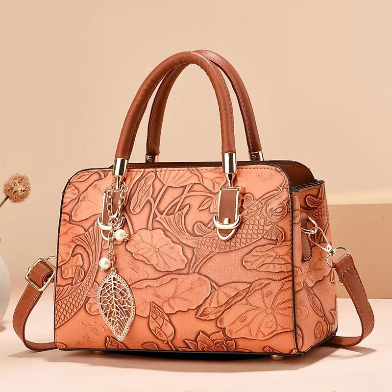Bolso de mujer de mediana edad 2025, nuevo bolso de moda para mujeres, bolso coreano simple para madres, bolso de hombro simple para el cabello