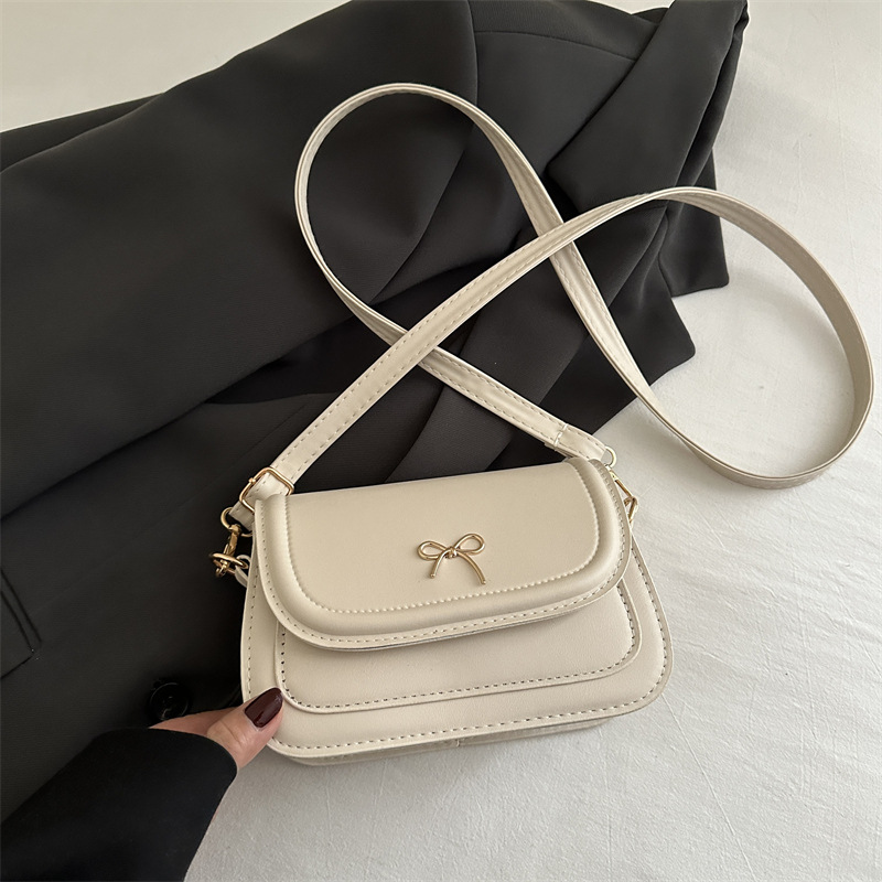 Bolso de lazo coreano para mujer 2025 primavera y verano nuevo bolso de silla simple de moda bolso de mensajero de hombro literario de moda