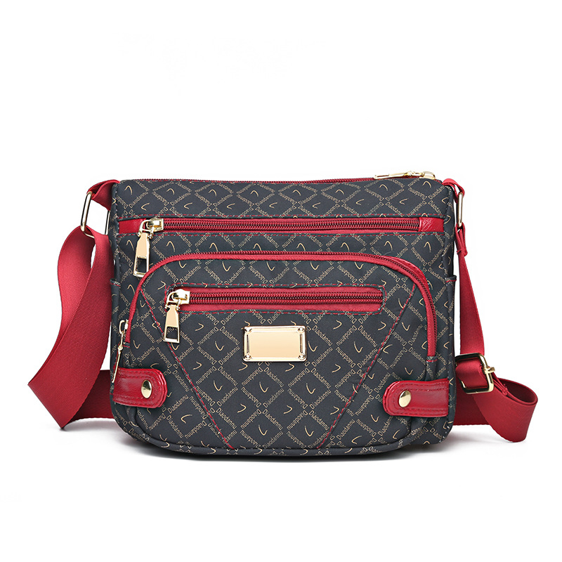 Borsa da donna 2023 Nuovo modello per anziani, borsa piccola stampata elegante di alta gamma, borsa a tracolla per donne di mezza età e_voghion.com