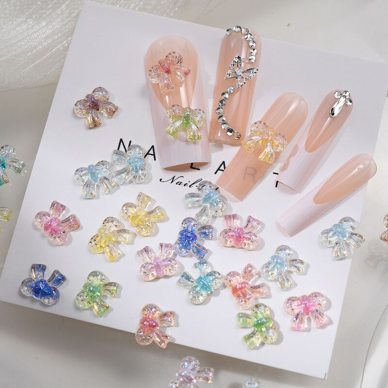 Ice transparent gold bow nail jewelry cute three-dimensional exquisite acrylic glitter bow tie diy nail accessories