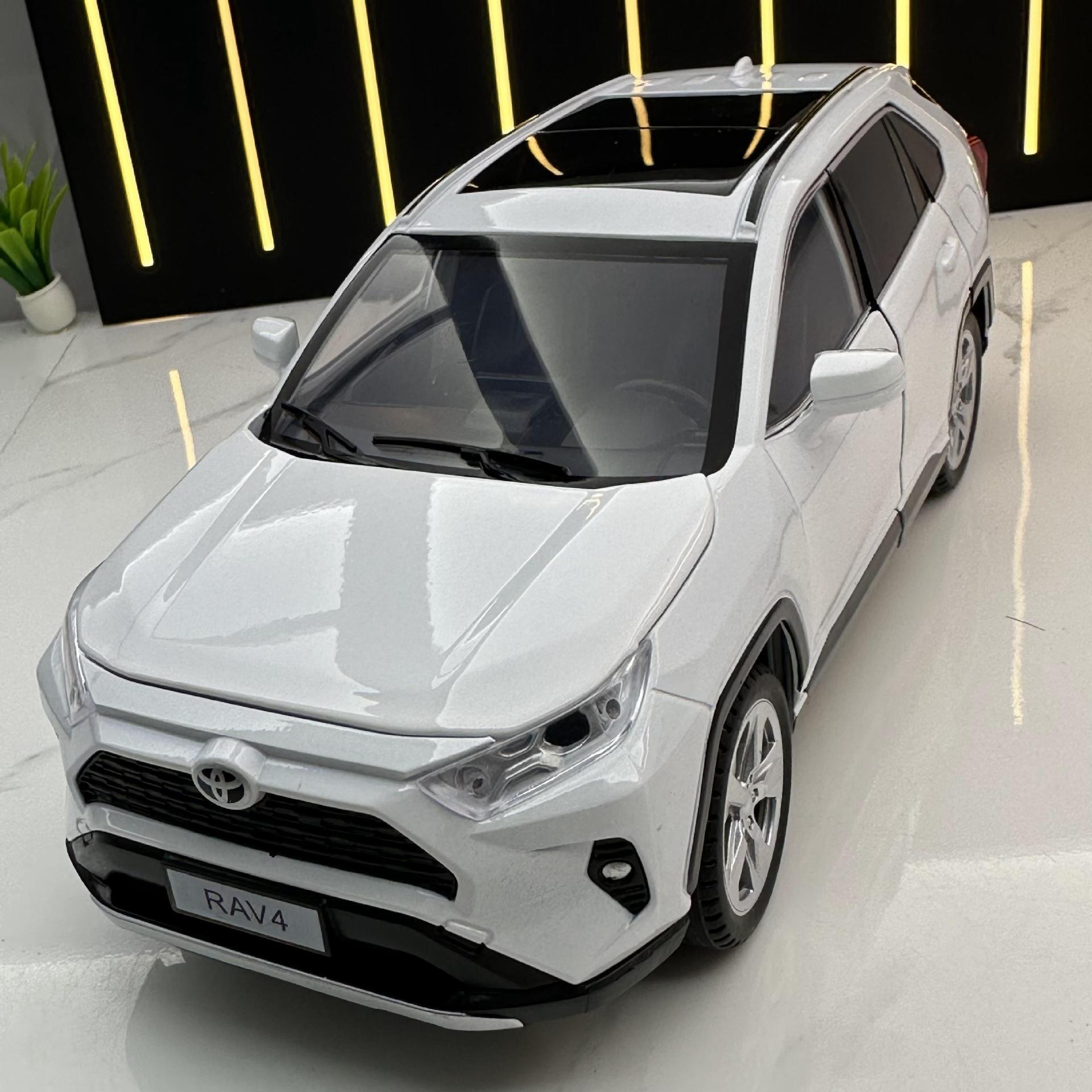 Zhiguan aleación modelo de coche 1:24 genuino Toyota RAV4 Rong Puerta Abierta sonido y luz Tire hacia atrás juguete vehículo todoterreno modelo péndulo
