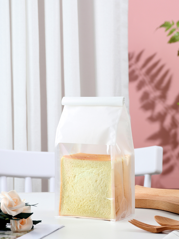 Bolsas de tostadas, bordes de alambre de hierro, sellado, pan rebanado, leche, dátiles, crispado de nieve, horneado transparente, punto oeste