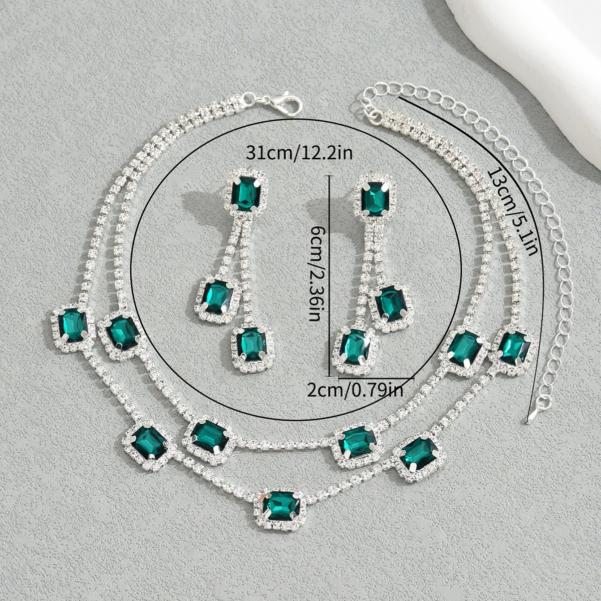 Set di gioielli di lusso collana con diamanti e orecchini smeraldo_voghion.com