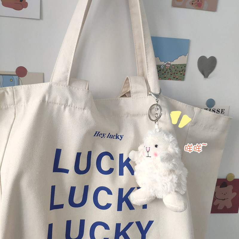 INS estilo colgante flor pequeña bolsa de dos colores adornos llavero decoración hembra accesorios de dibujos animados lindo hembra