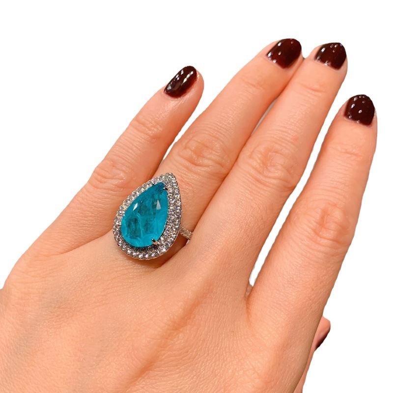 Zhuang Sheng joyería al por mayor simulación Paraiba estilo retro brillante diamante completo con incrustaciones de lujo colgante anillo pendientes traje