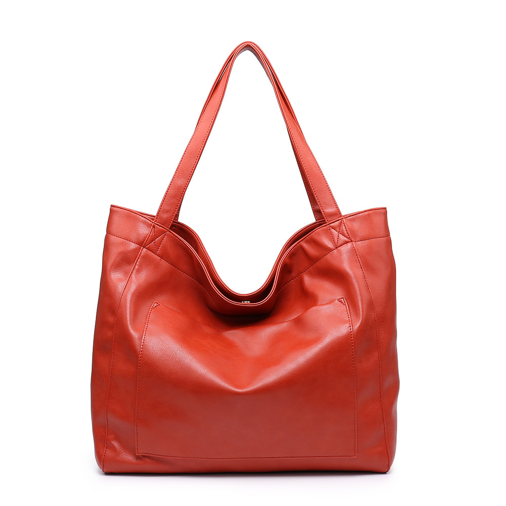 Dames handtas van vintage geolied leer met schouderriem_voghion.com