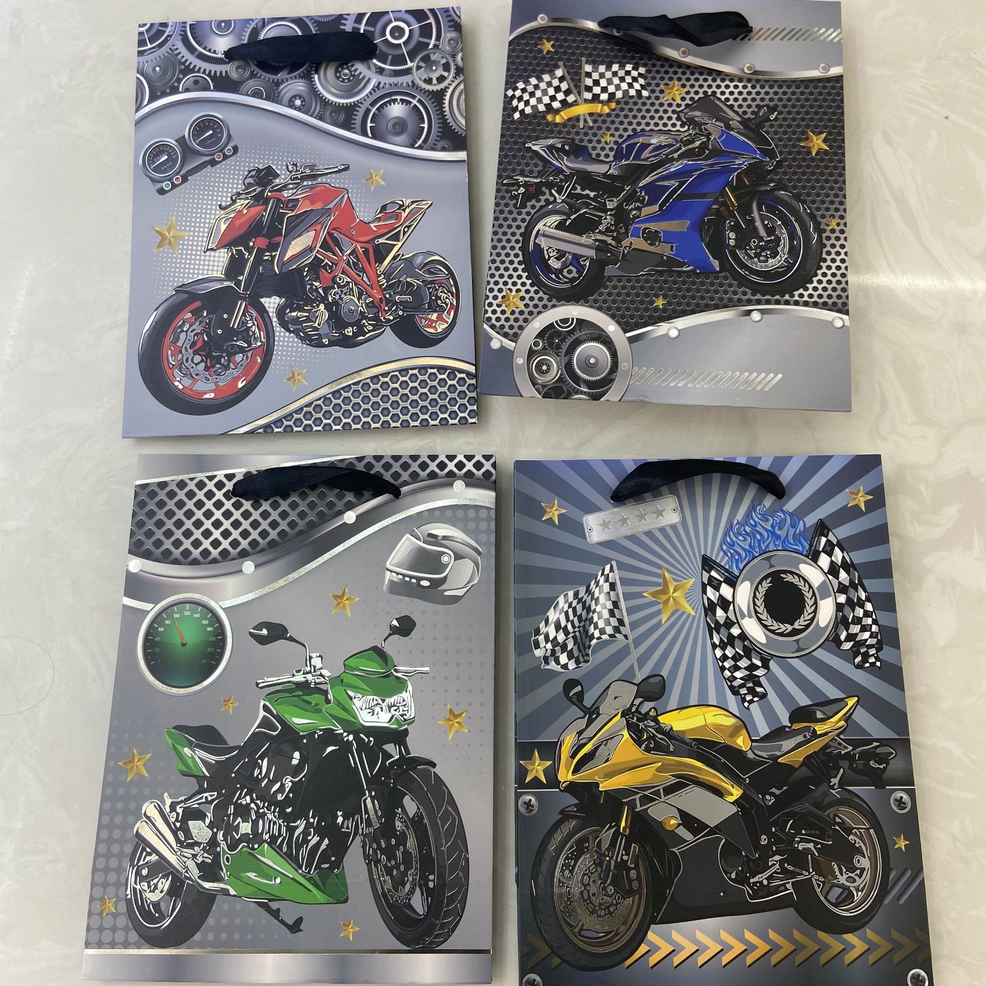 Bolsas de regalo de cumpleaños de alto nivel, bolsas de mano, bolsas de papel de embalaje de motocicleta simples, bolsas de regalo de mano