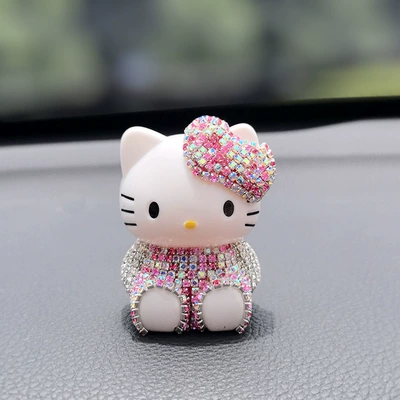 New Car Deodorizing Air Conditioning — Car ornaments - colorful-pink-clothes-kitten-ornaments